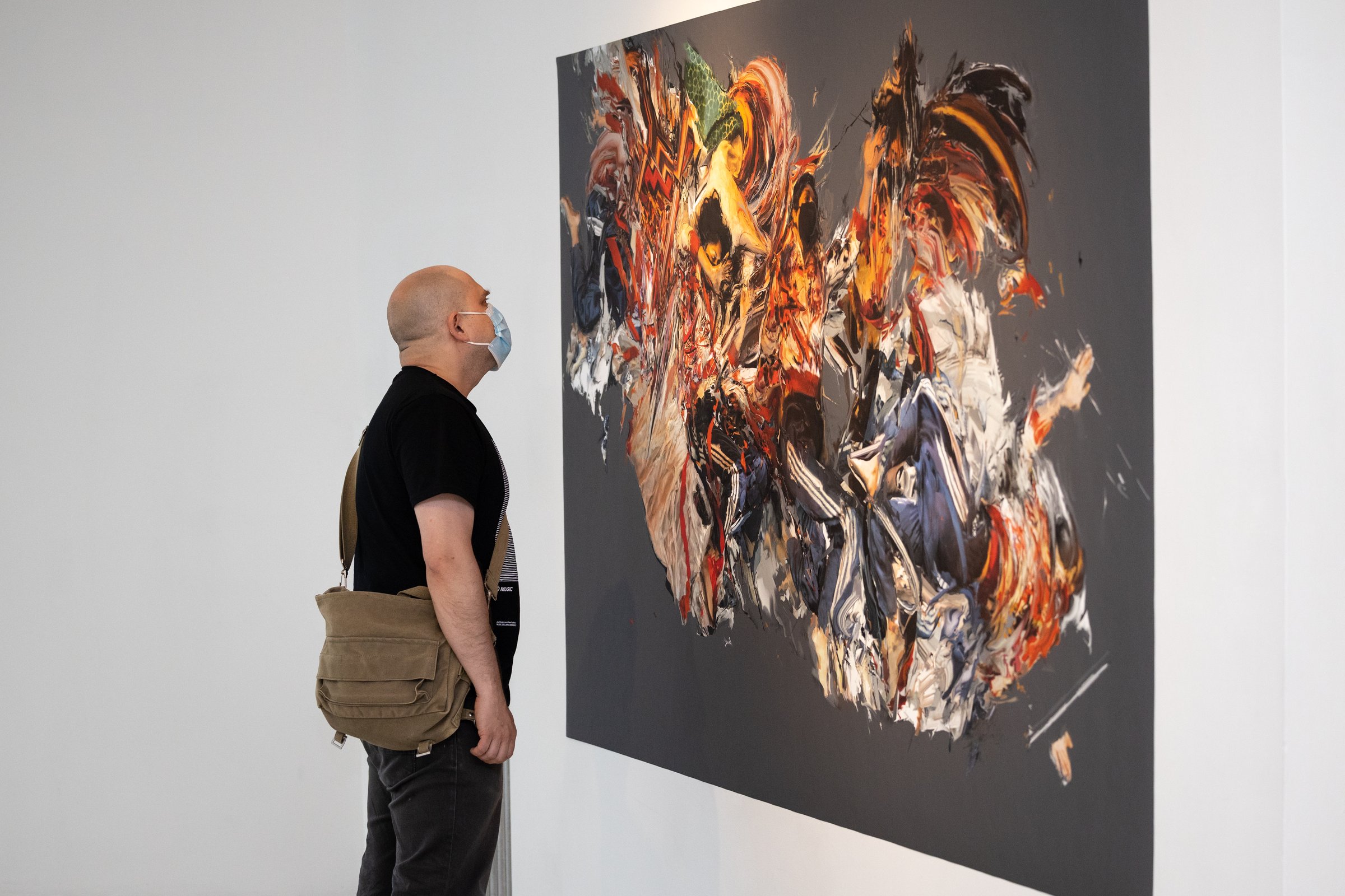 A Constructive Instability — visitor viewing large-scale print at Art Mûr