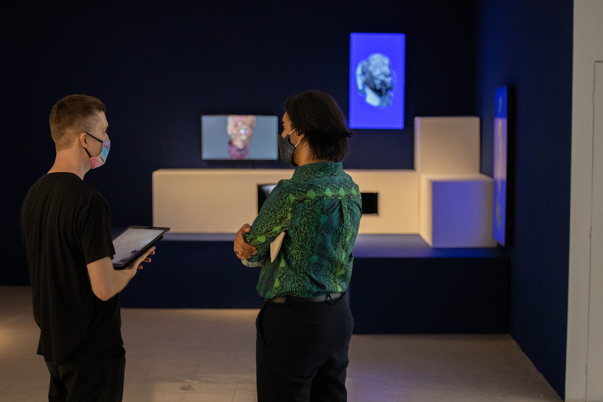 Auriea Harvey — two visitors viewing exhibition with tablet, Art Mûr gallery