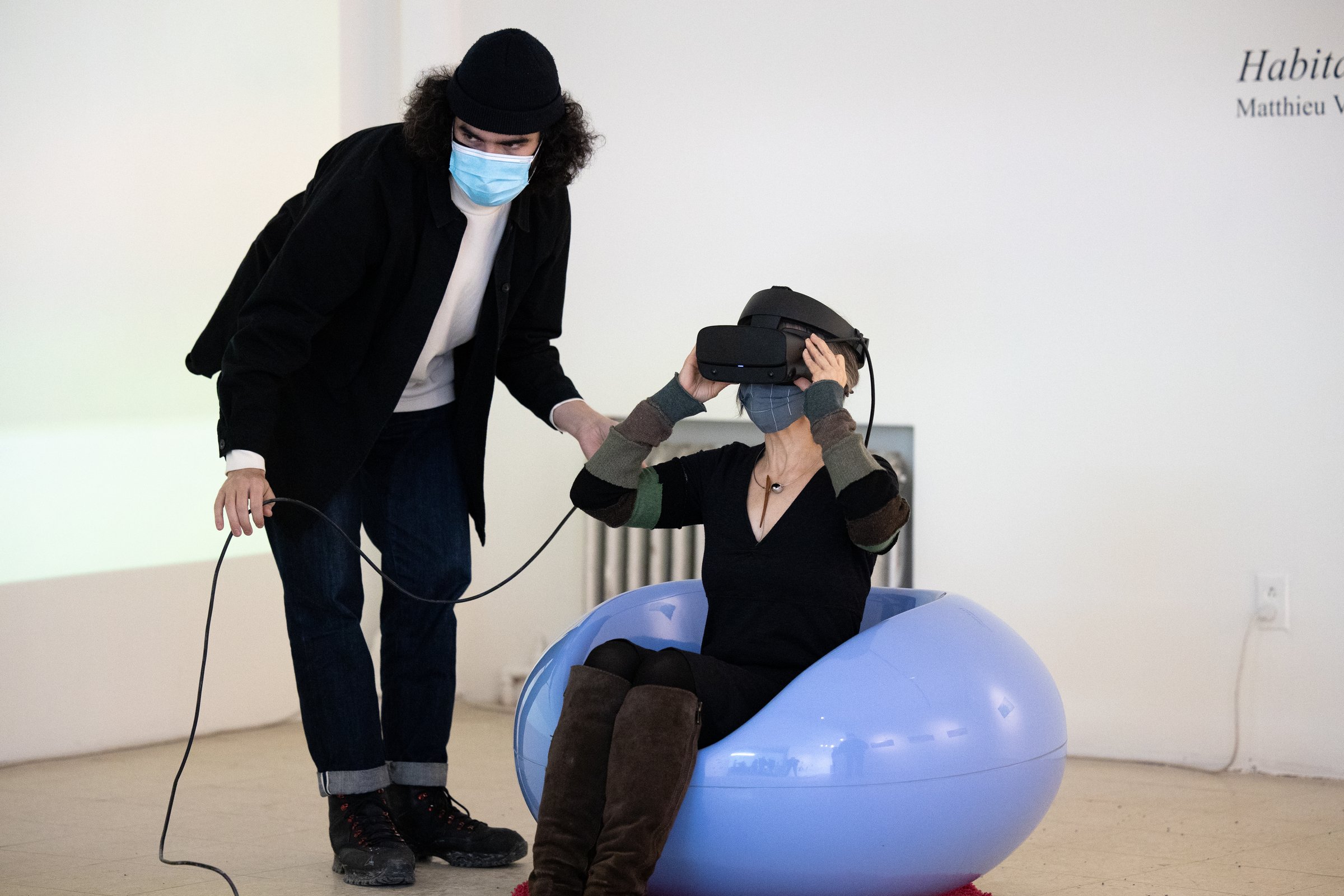 Habitats — gallery opening, visitors engaging with the exhibition